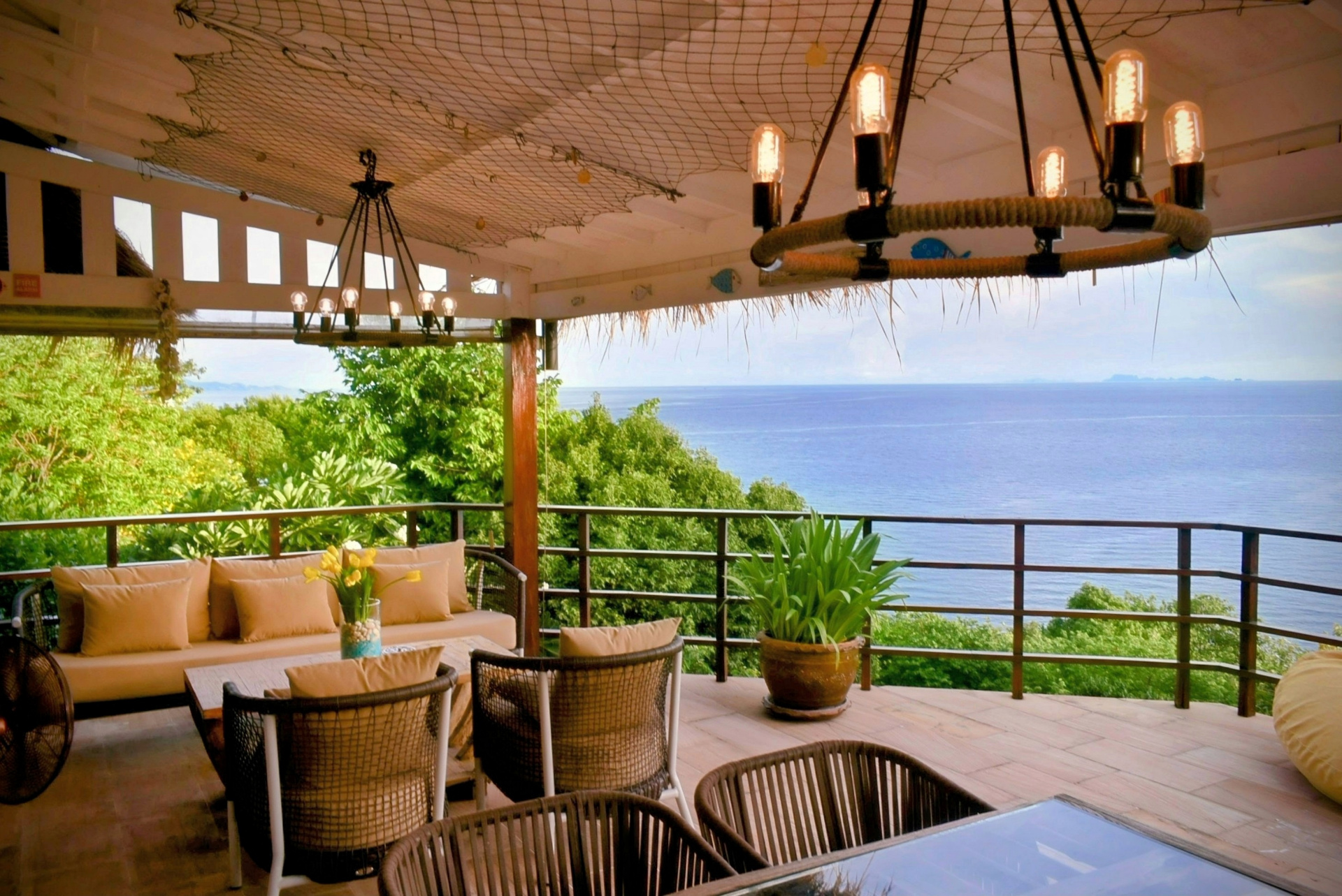 Covered terrace with ocean view at The Fisherman’s House