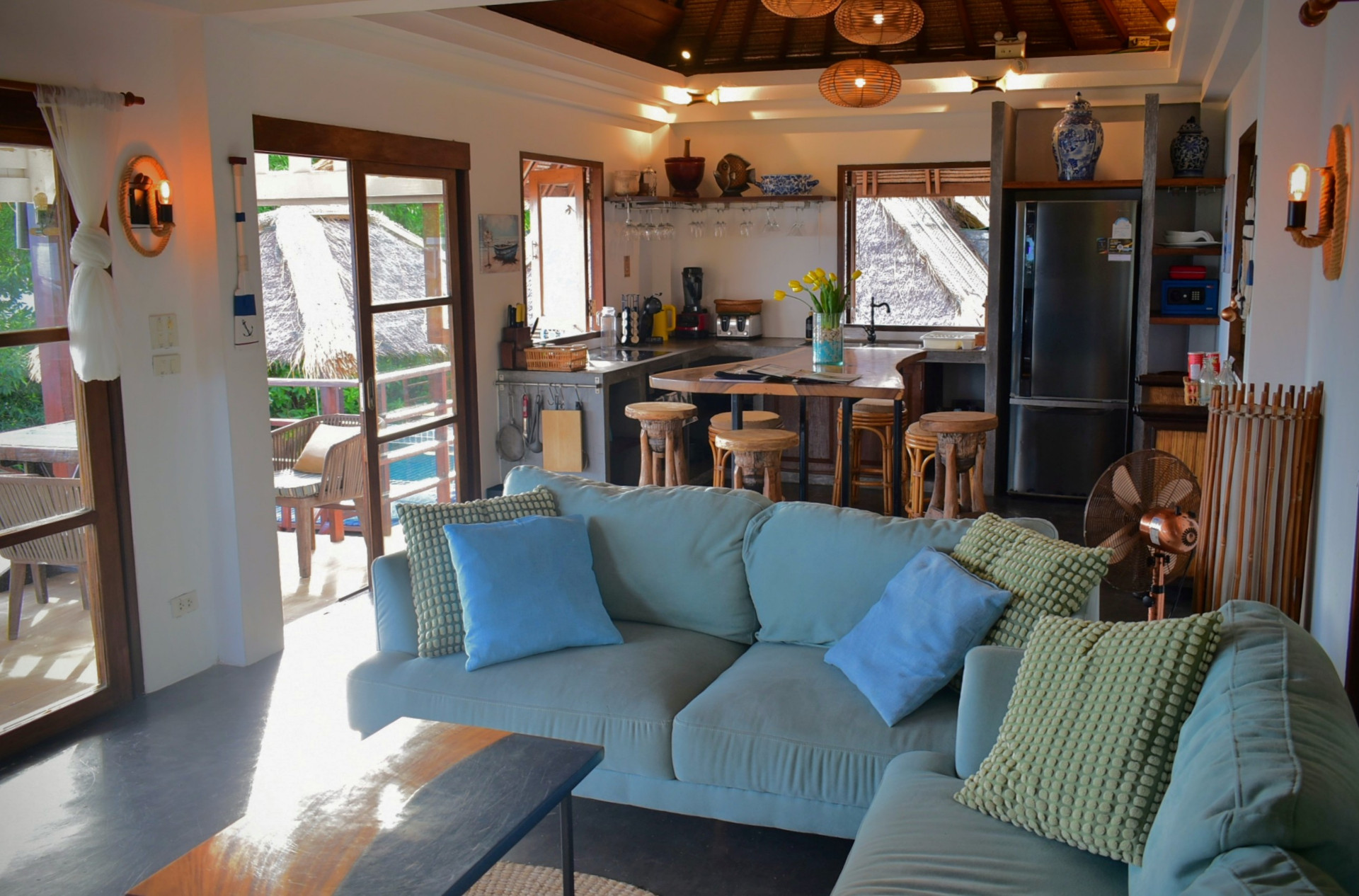 Open living space leading to the kitchen and pool terrace at The Fisherman’s House